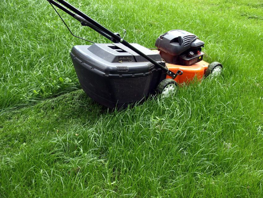 Mowing a lawn with a lawn mower