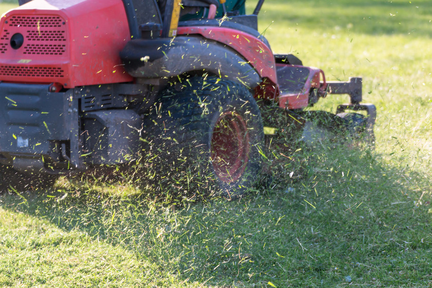 Riding Lawn Equipment with operator for periodically garden upkeep